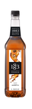 Maison Routin 1883 Amaretto Flavoring syrup is a brownish color in a nicely labeled bottle