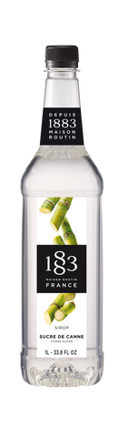 1883 cane sugars is a clear liquid with green cane sugar stocks on the label 