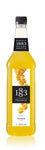 1883 Mango syrup is bright yellow with yellow mango squares sliced on the label