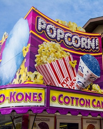 Popcorn, cotton candy and other concessions are supplied by this brightly colored trailer