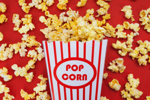 A red an white bucket of fresh popcorn popped at a business in Hudson Wisconsin located in the St. Croix Valley twin cities metro area