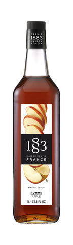 Maison Routin 1883 Apple flavoring syrup has sliced apples on the label and is the color of apple cider