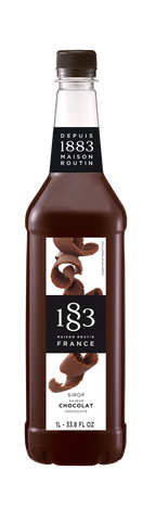 1883 Chocolate syrup is brown with ribbons of dark chocolate on the white label