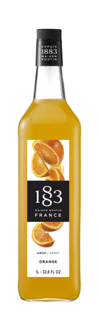 1883 Orange is a yellowish orange in color with orange wedges on the label