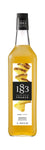 1883 Pineapple syrup is yellow with bright yellow pineapple slices on the label 