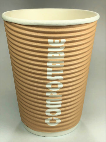 tan ripple wall cup with bold white lettering saying compostable
