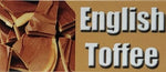light brown English Toffee wording  next to pieces of broken up English Toffee