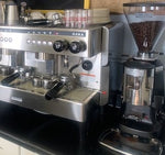 a new Nera espresso machine next to a new Mazzer espresso grinder located at a coffee shop in northern Wisconsin
